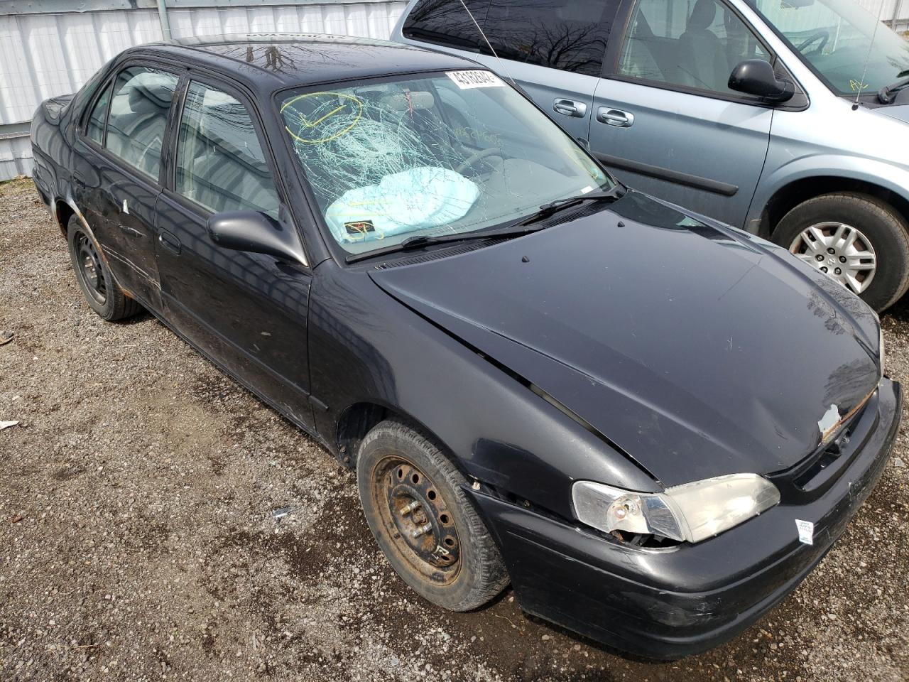 TOYOTA COROLLA VE 1999 with VIN 2T1BR12E1XC749323 - Photo from auction