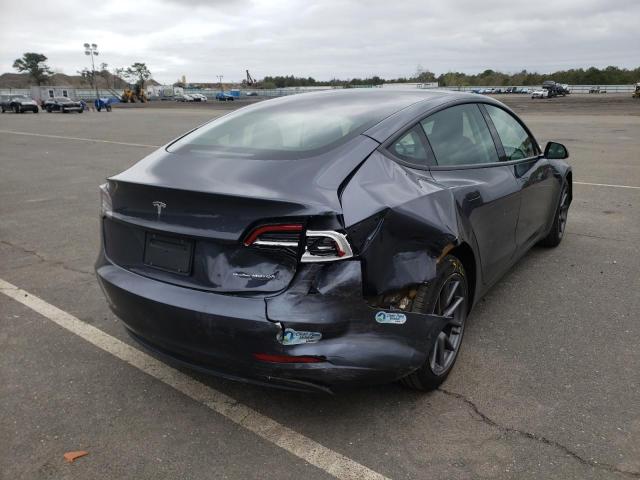 Photo 4 from auction – 2021 TESLA MODEL 3 with VIN 5YJ3E1EB4MF979205