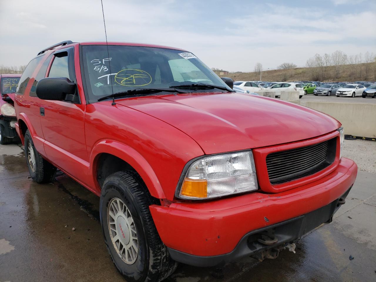 GMC JIMMY 2000 with VIN 1GKCT18W0YK198991 - Photo from auction