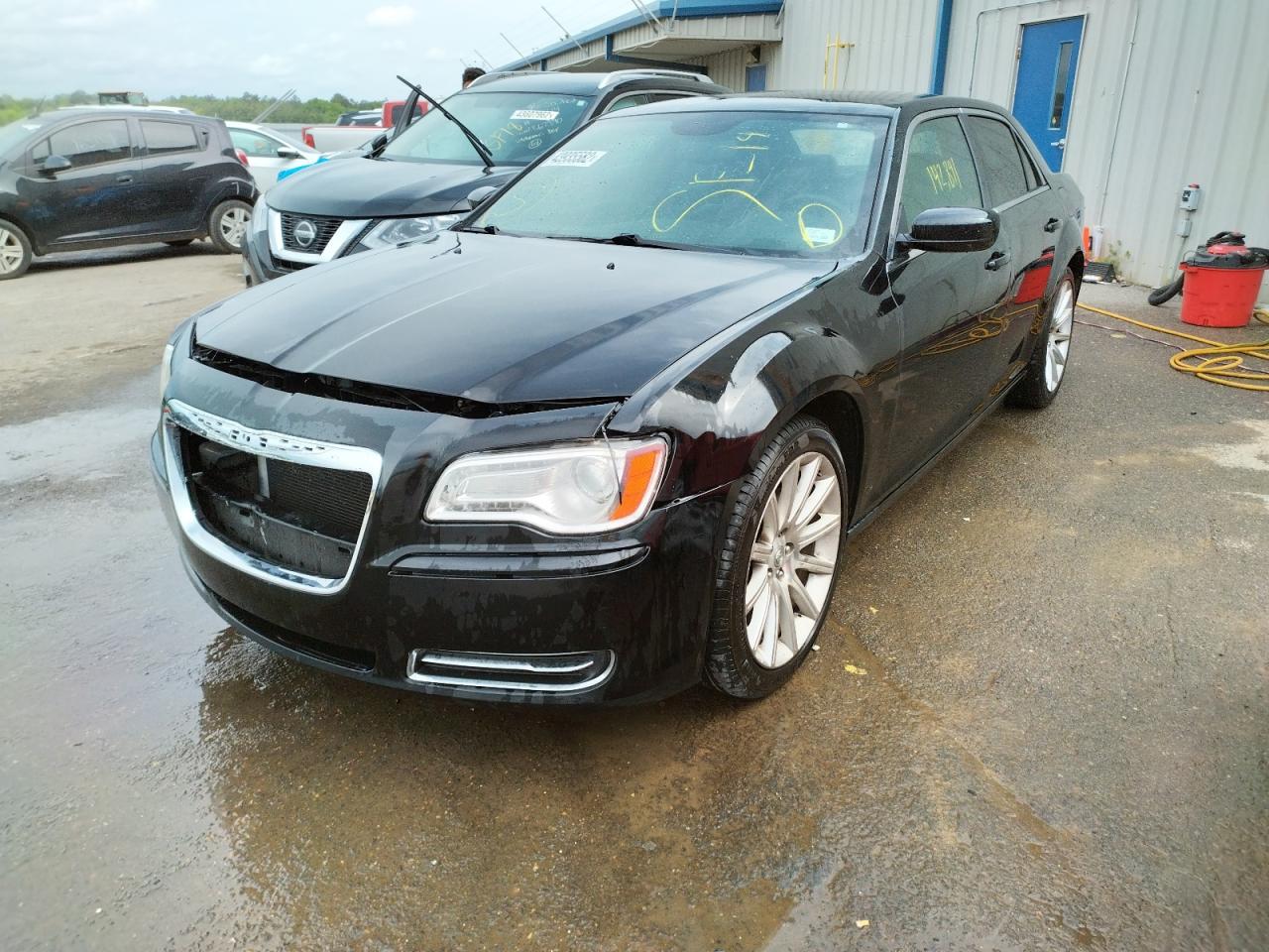 Photo 2 from auction – 2014 CHRYSLER 300 with VIN 2C3CCAAG8EH182754