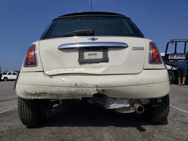 Photo 9 from auction – 2009 MINI COOPER with VIN WMWMF33559TW76946