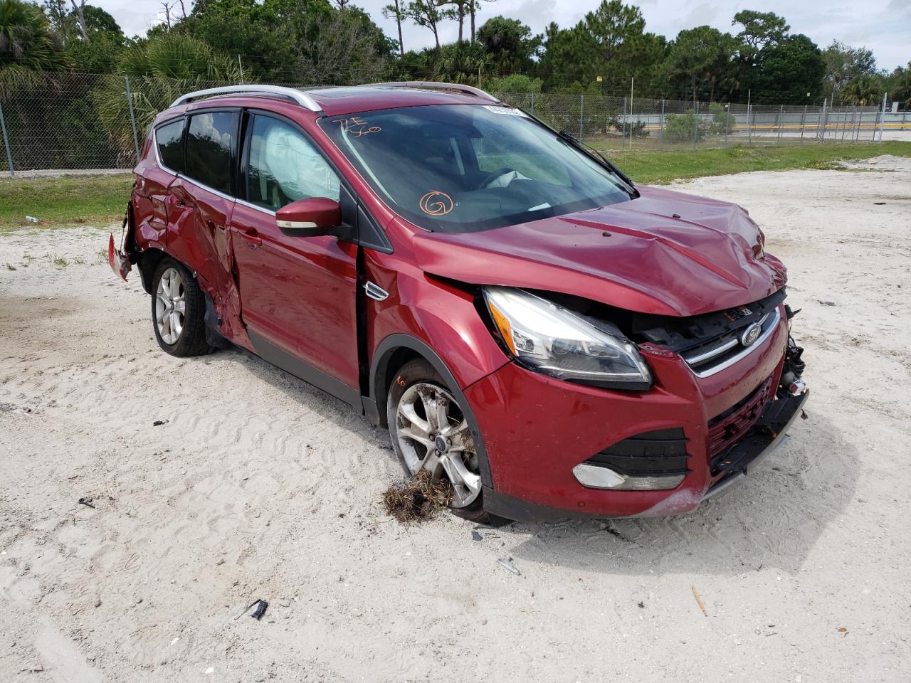 FORD ESCAPE TIT 2016 with VIN 1FMCU0J97GUB03221 - Photo from auction