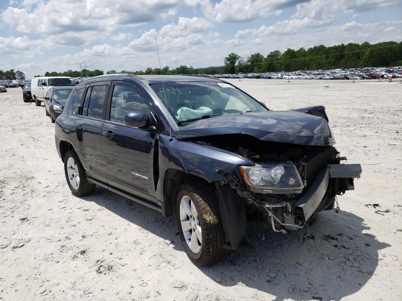 JEEP COMPASS LA 2014 with VIN 1C4NJCEA4ED643344 - Photo from auction