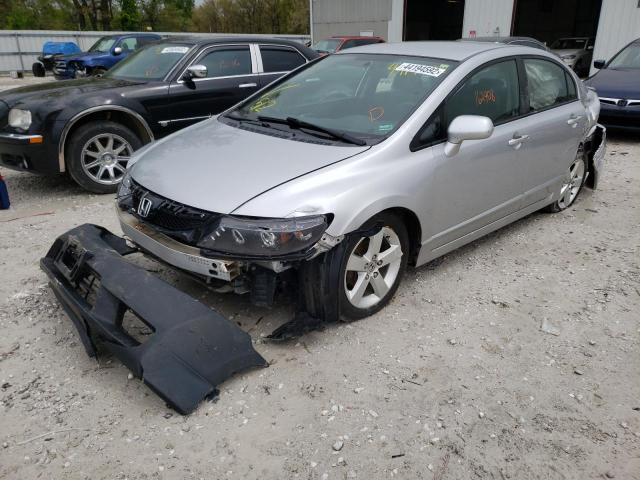 Photo 2 from auction – 2011 HONDA CIVIC LX-S with VIN 19XFA1F60BE034233