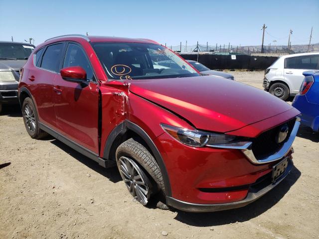 MAZDA CX-5 TOURI 2021 with VIN JM3KFBCMXM1365035 - Photo from auction
