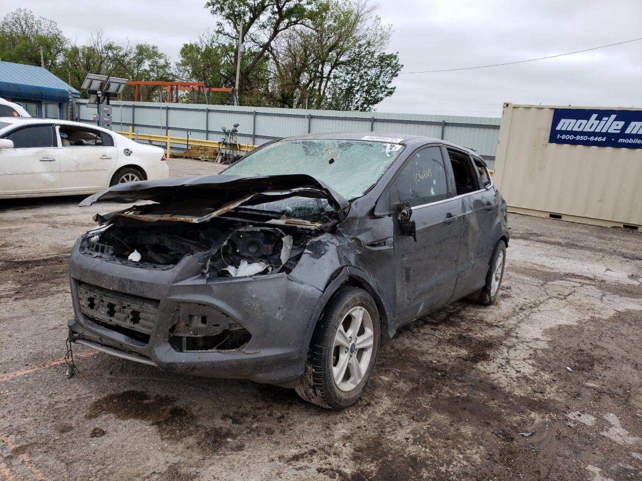 Photo 2 from auction – 2016 FORD ESCAPE SE with VIN 1FMCU0G71GUB37418