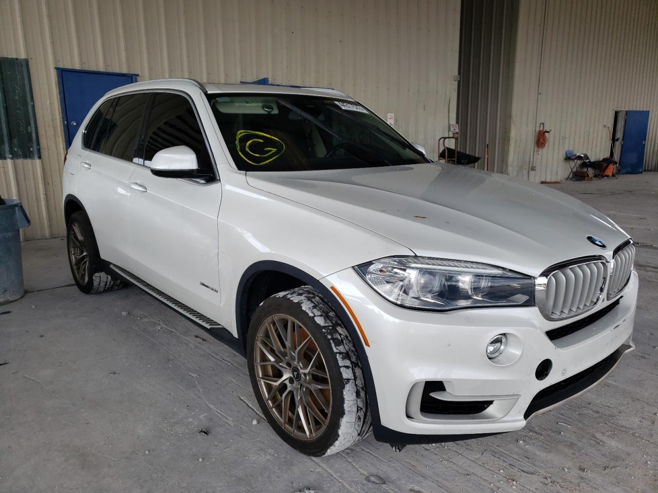 BMW X5 XDRIVE5 2015 with VIN 5UXKR6C51F0J79293 - Photo from auction