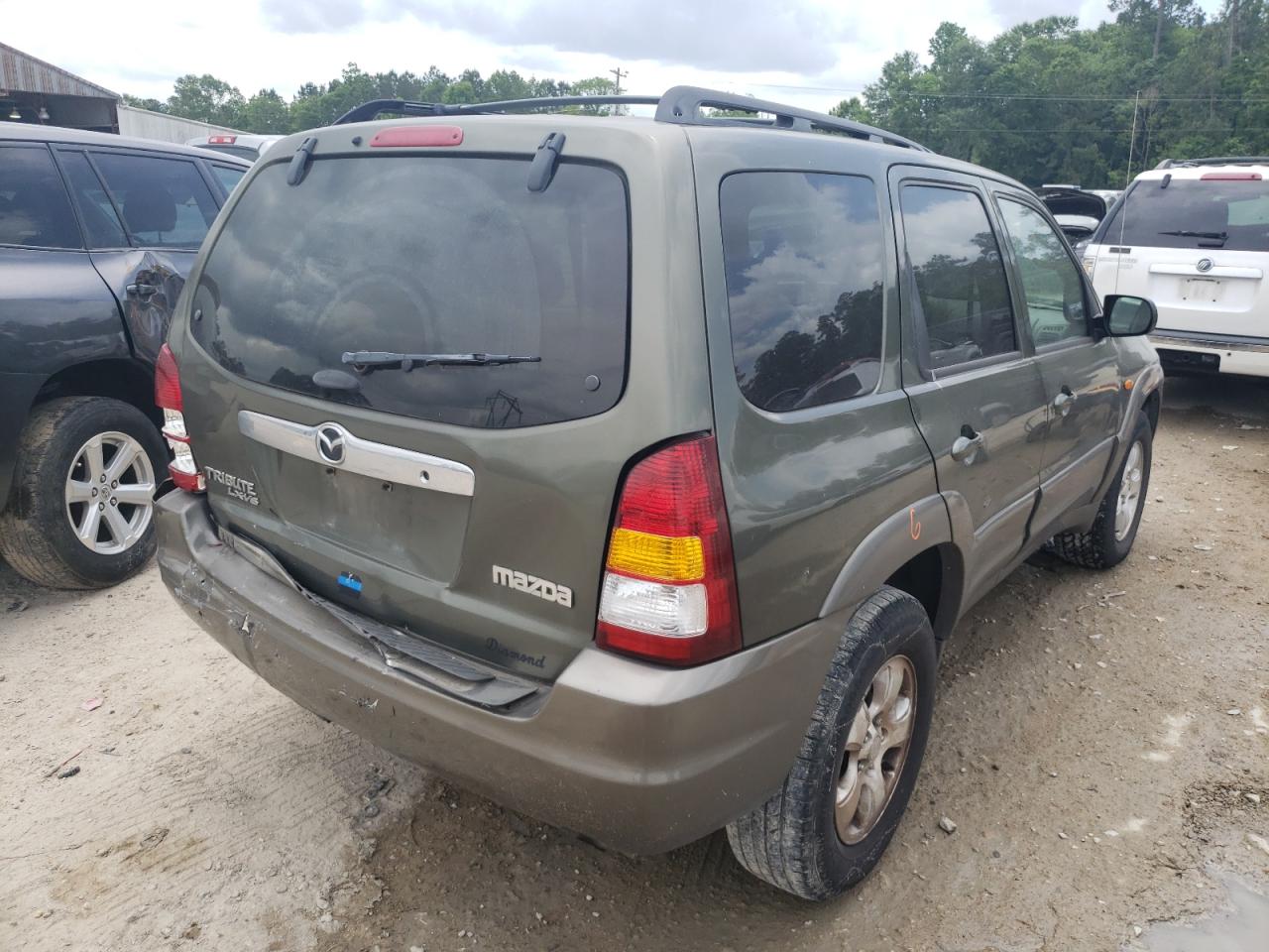 Photo 4 from auction – 2002 MAZDA TRIBUTE LX with VIN 4F2YU091X2KM40673