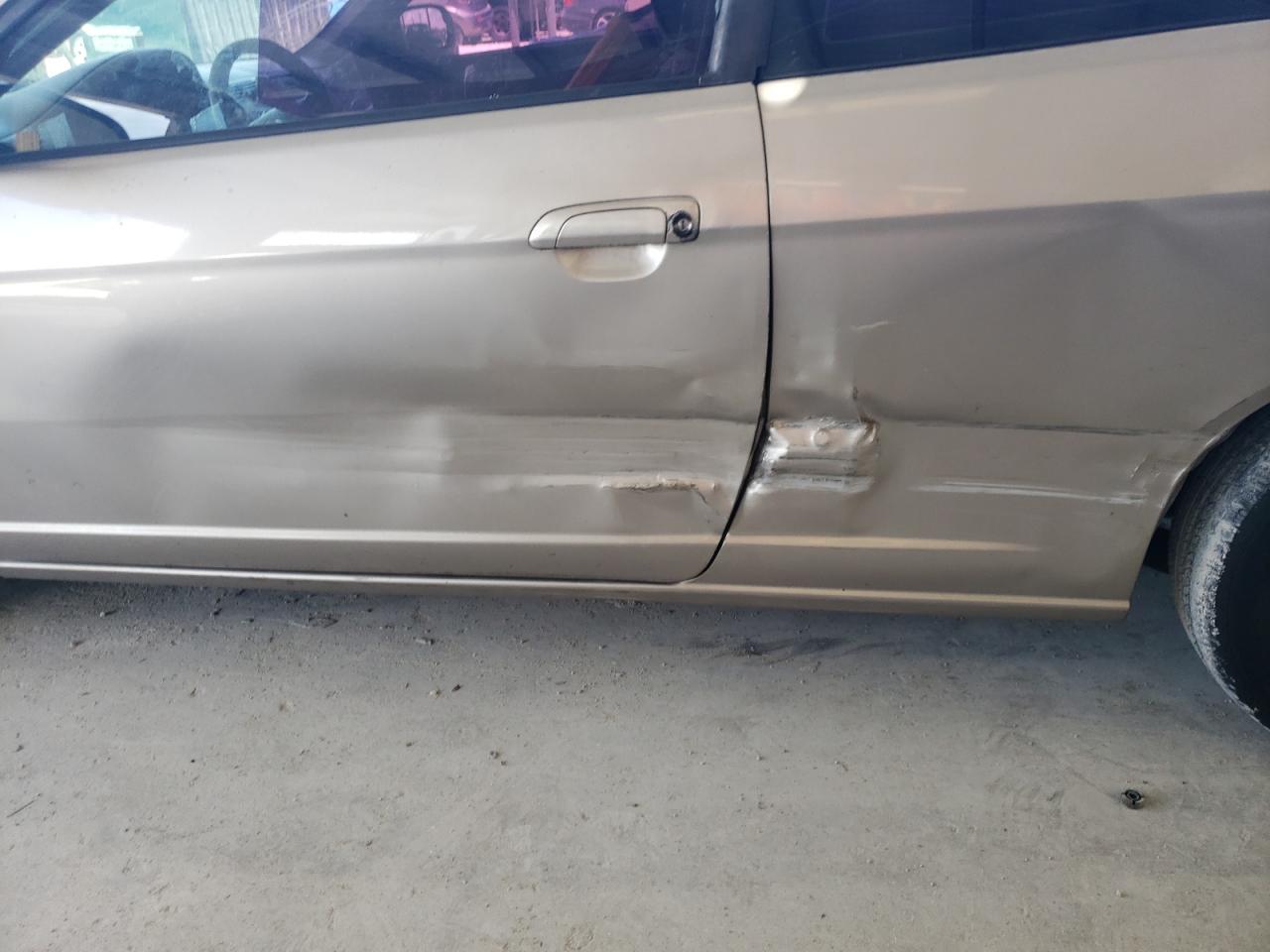 Photo 9 from auction – 2002 HONDA CIVIC LX with VIN 1HGEM22562L013028