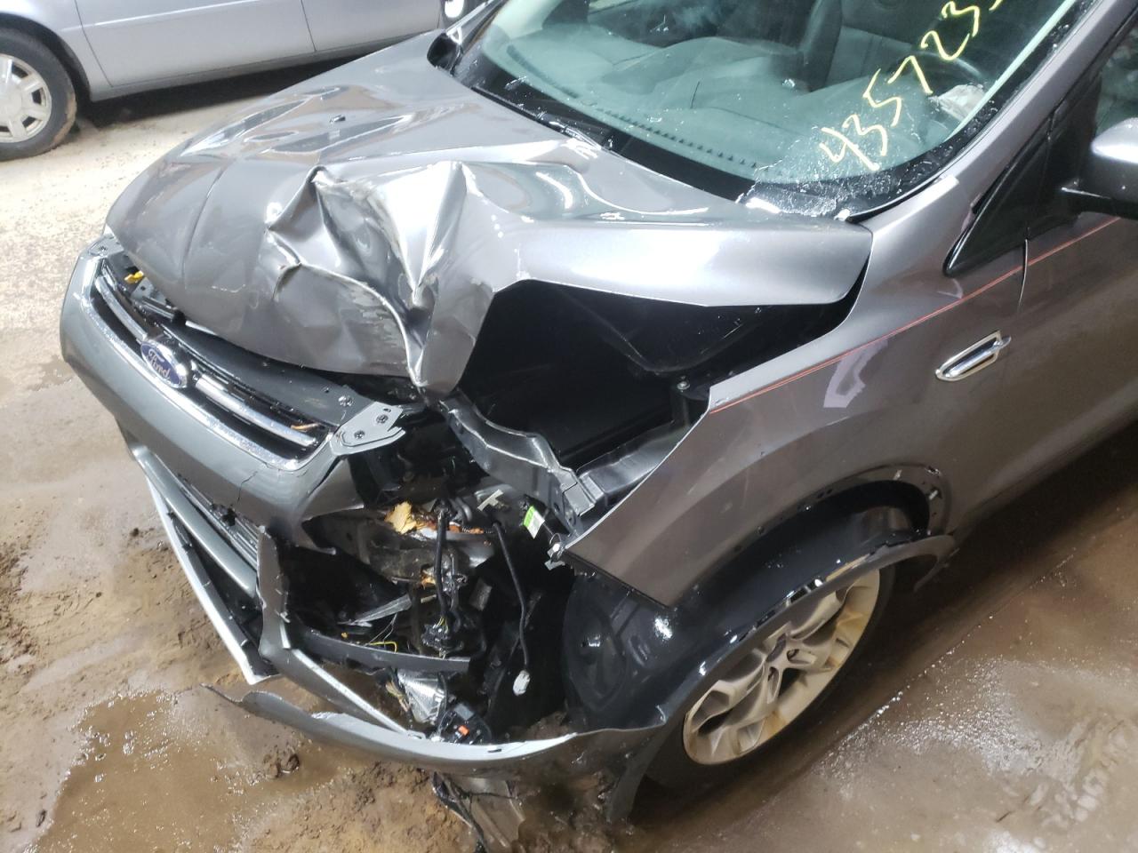 Photo 9 from auction – 2013 FORD ESCAPE TIT with VIN 1FMCU9J93DUC75827