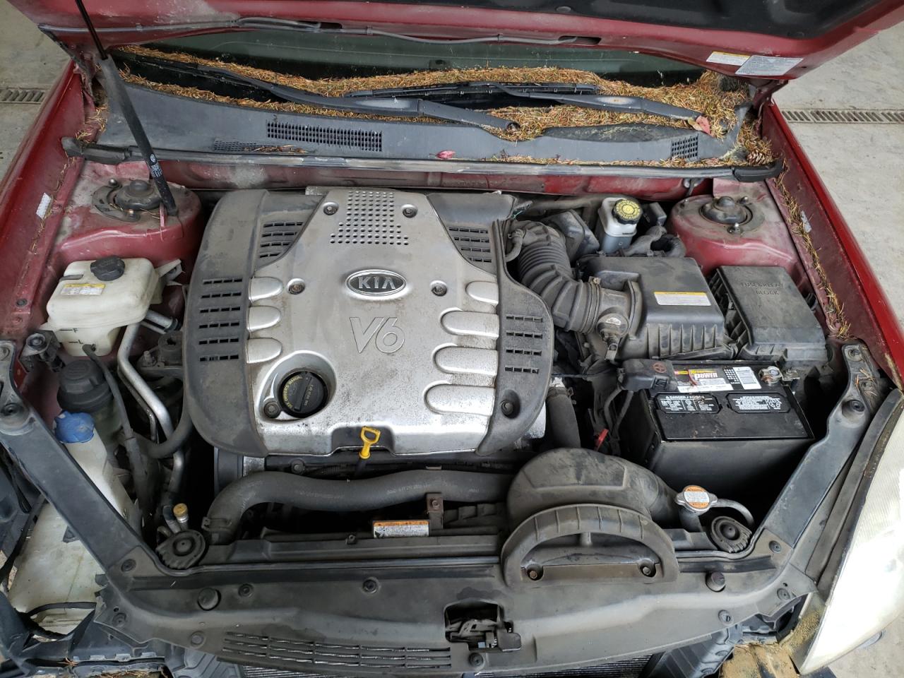 Photo 7 from auction – 2006 KIA OPTIMA LX with VIN KNAGE124165064868