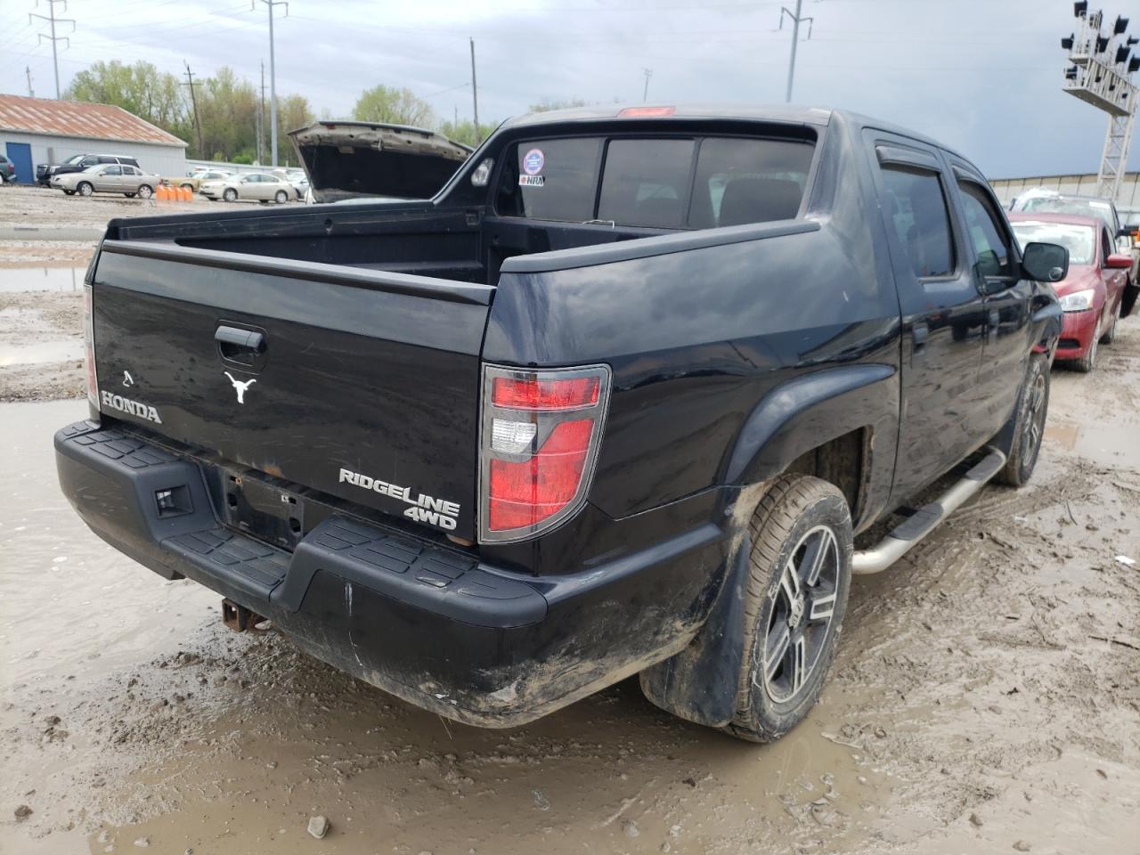 Photo 4 from auction – 2013 HONDA RIDGELINE with VIN 5FPYK1F71DB004550