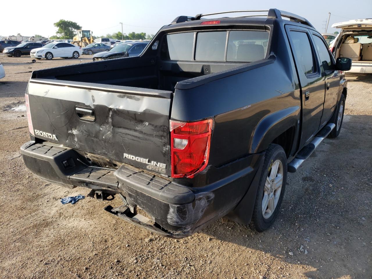 Photo 4 from auction – 2009 HONDA RIDGELINE with VIN 5FPYK16509B105567