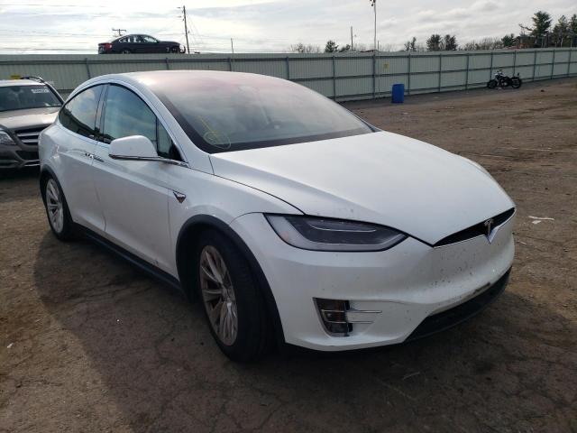 TESLA MODEL X 2018 with VIN 5YJXCBE21JF116810 - Photo from auction
