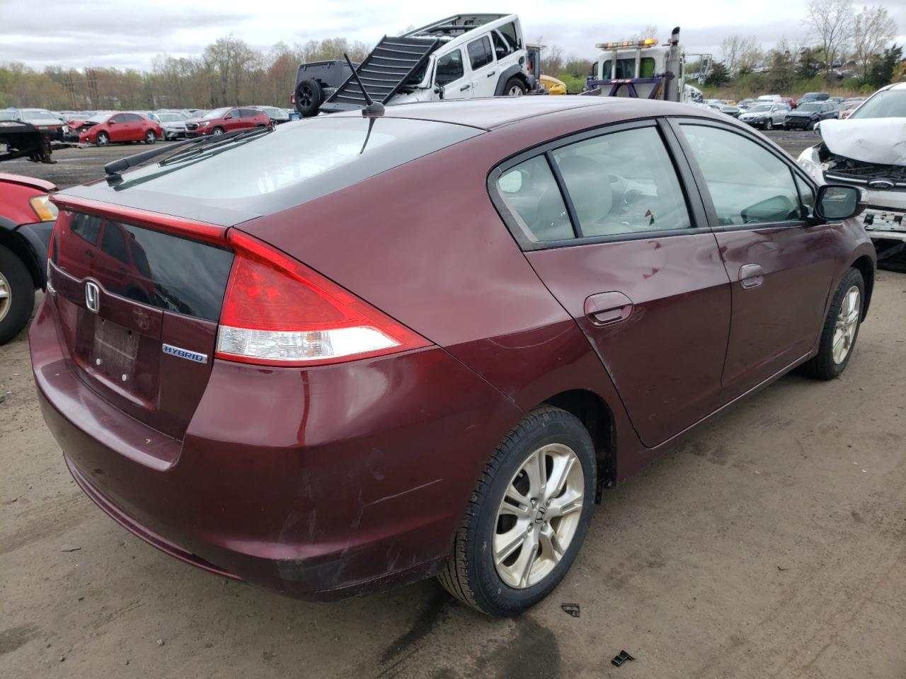 Photo 4 from auction – 2011 HONDA INSIGHT with VIN JHMZE2H77BS009290