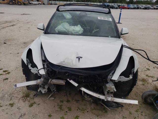 Photo 9 from auction – 2021 TESLA MODEL 3 with VIN 5YJ3E1EB9MF974324