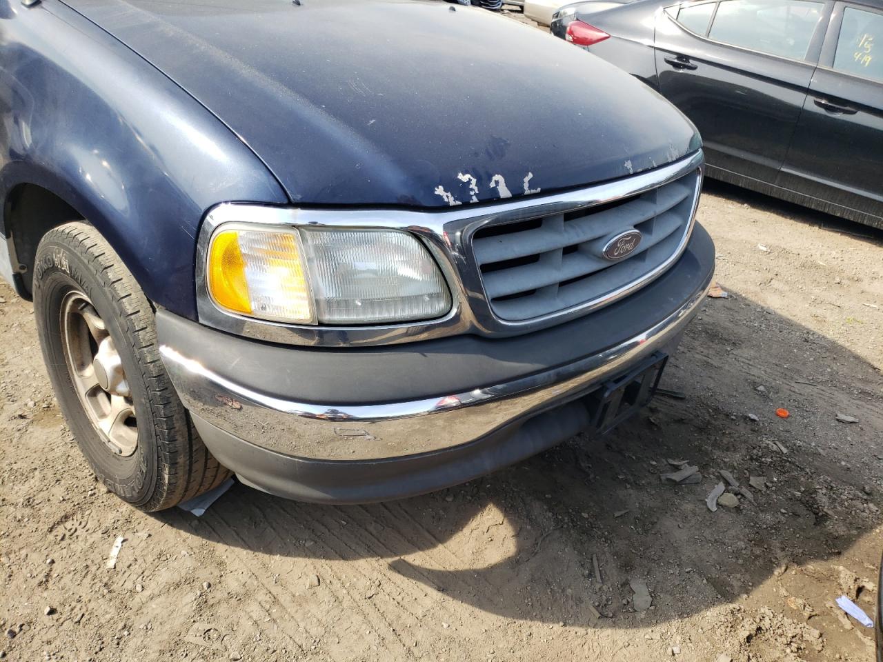 Photo 9 from auction – 2003 FORD F150 with VIN 1FTRX17213NB16573