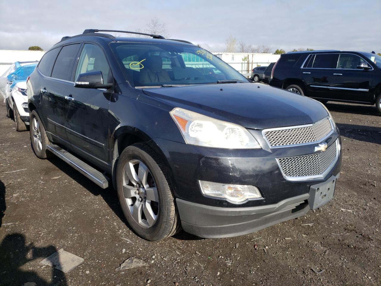 CHEVROLET TRAVERSE 2011 with VIN 1GNKVLED7BJ322663 - Photo from auction