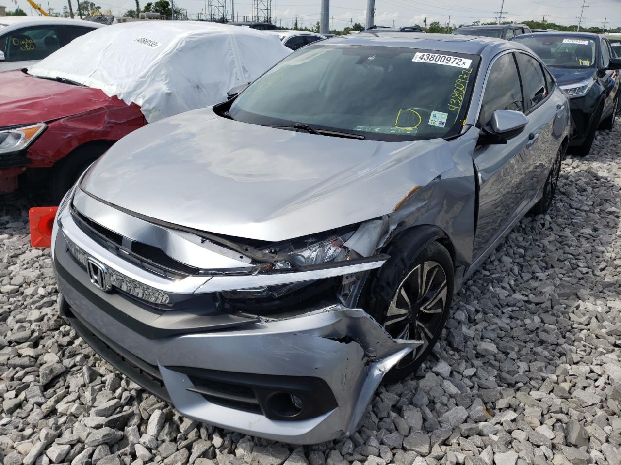 Photo 2 from auction – 2018 HONDA CIVIC EX with VIN JHMFC1F38JX004152