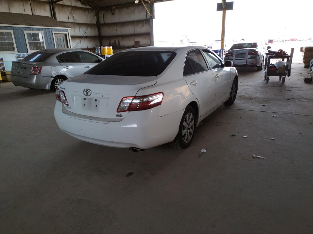 Photo 4 from auction – 2007 TOYOTA CAMRY HYBR with VIN JTNBB46K473034448