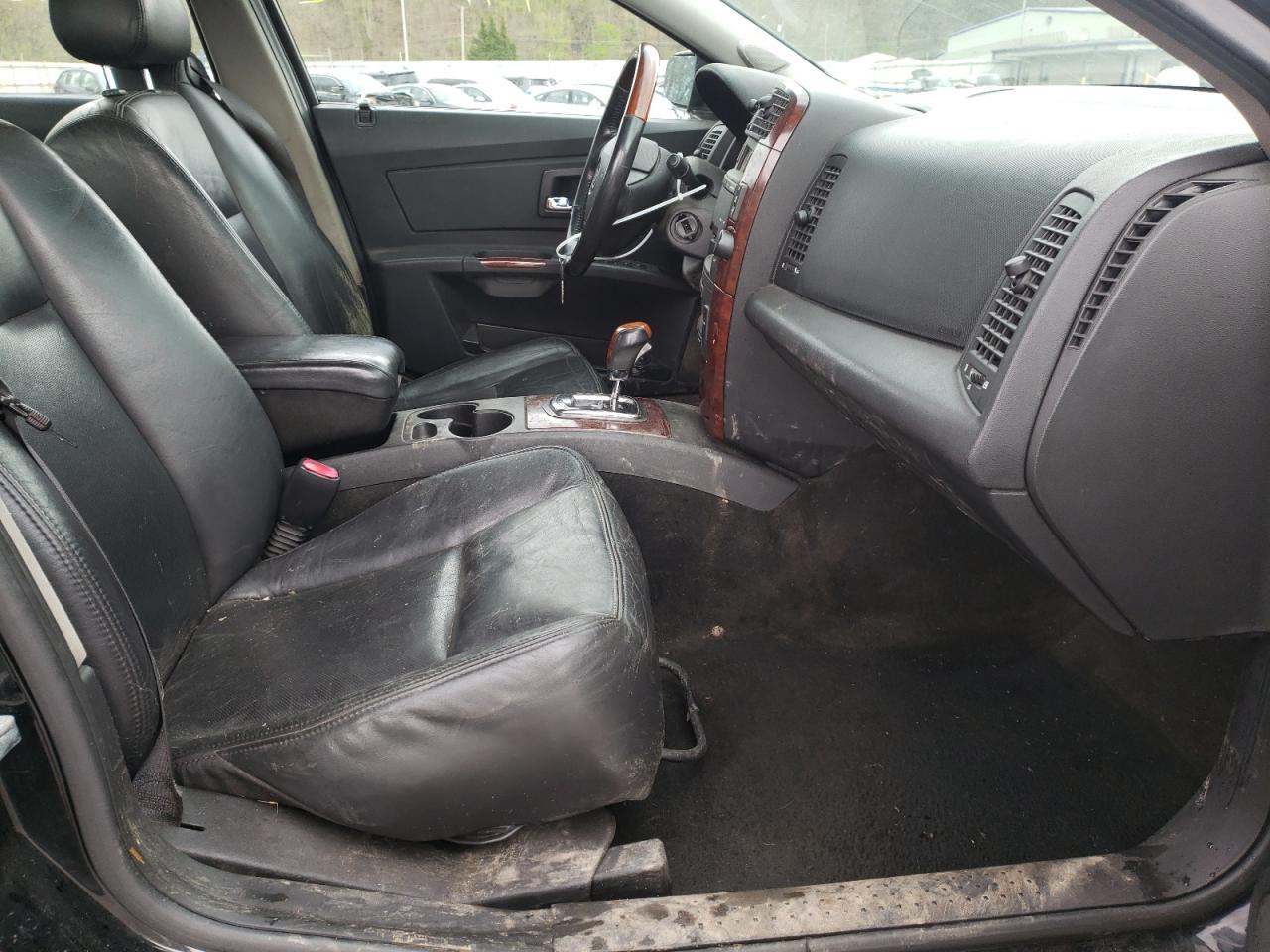 Photo 5 from auction – 2006 CADILLAC CTS HI FEA with VIN 1G6DP577160210714
