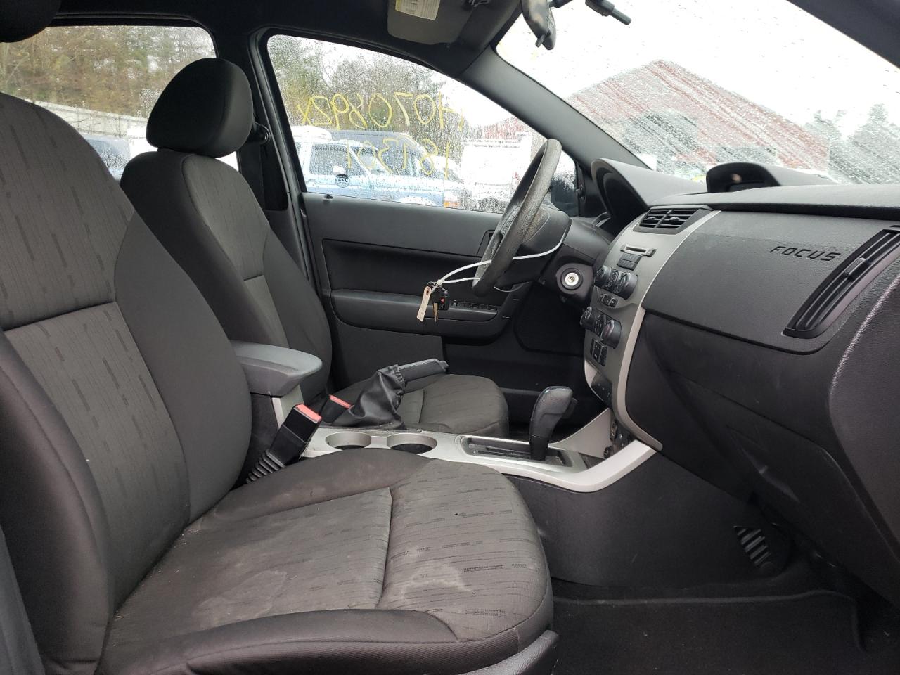 Photo 5 from auction – 2011 FORD FOCUS SE with VIN 1FAHP3FNXBW104830