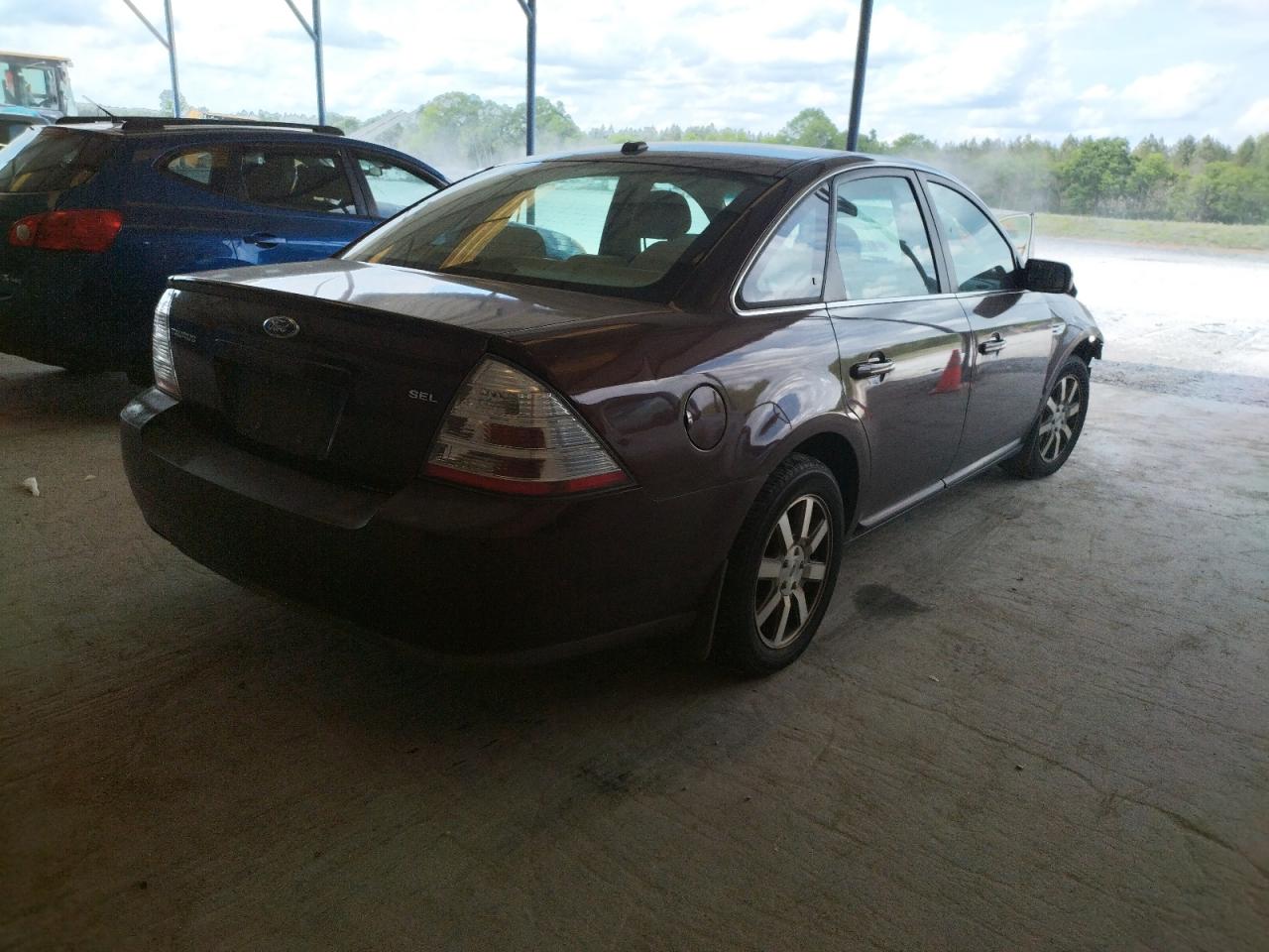 Photo 4 from auction – 2009 FORD TAURUS SEL with VIN 1FAHP24W89G109101