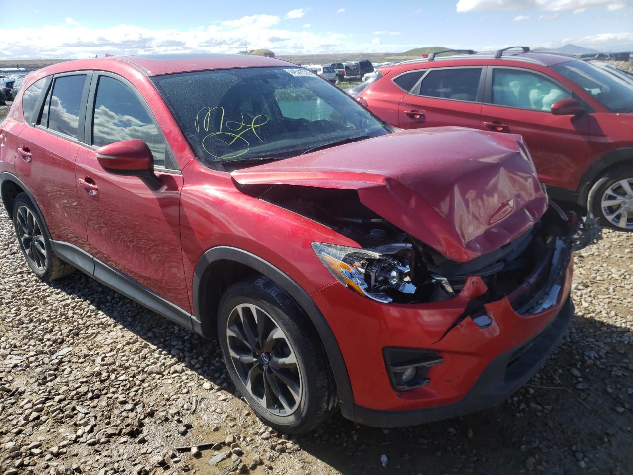 MAZDA CX-5 GT 2016 with VIN JM3KE4DY2G0797323 - Photo from auction