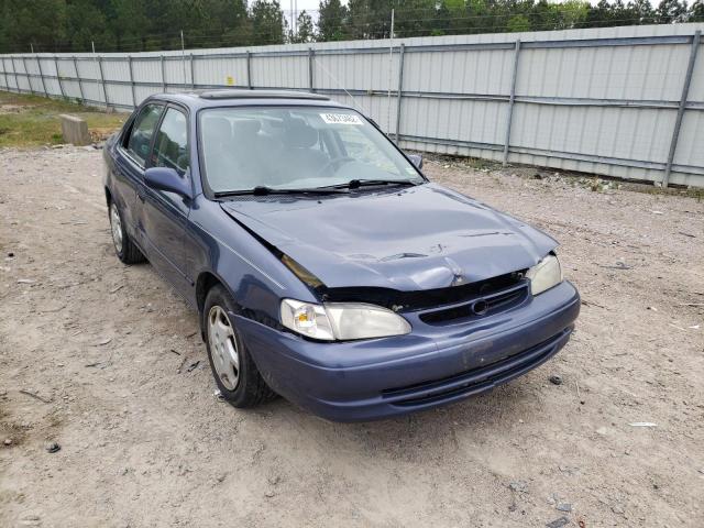 TOYOTA COROLLA VE 2000 with VIN 2T1BR12E4YC345434 - Photo from auction
