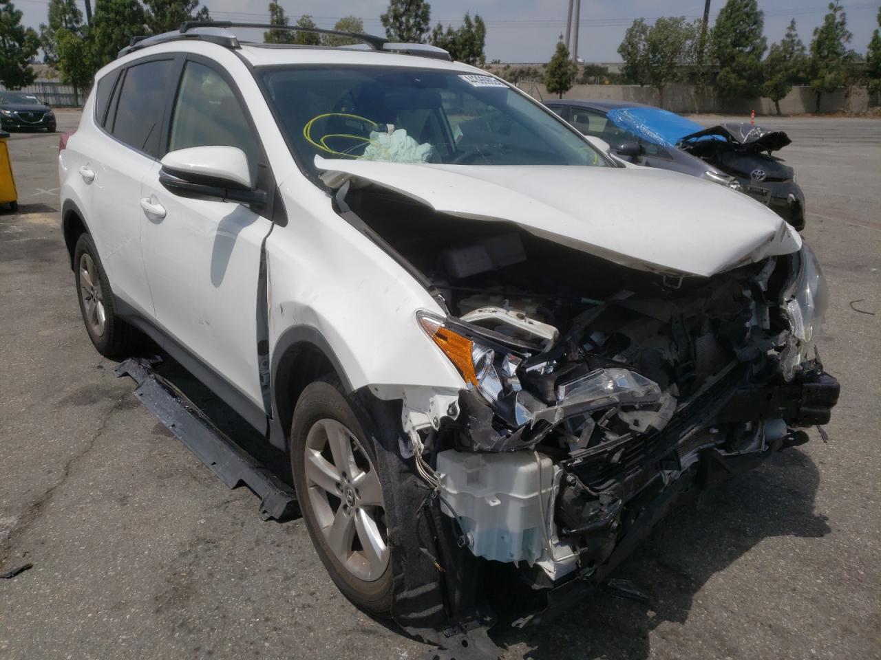 TOYOTA RAV4 XLE 2015 with VIN JTMWFREV2FD075754 - Photo from auction