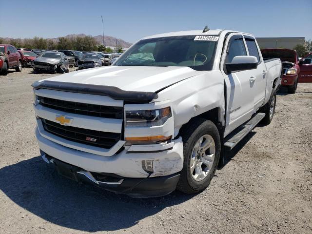 Photo 2 from auction – 2018 CHEVROLET SILVERADO with VIN 3GCUKREC5JG612405
