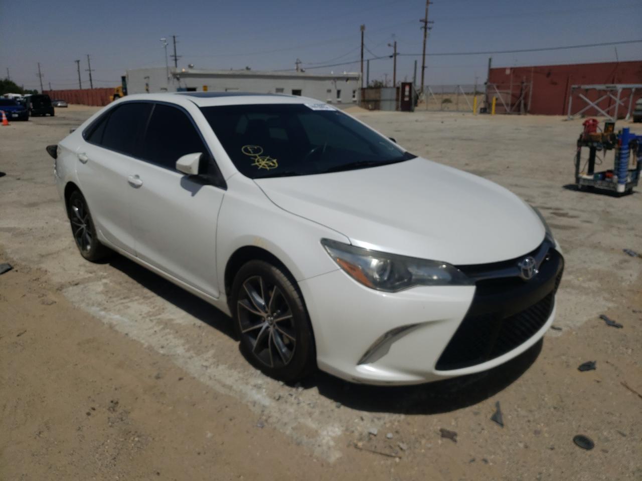 TOYOTA CAMRY LE 2016 with VIN 4T1BF1FK8GU597418 - Photo from auction