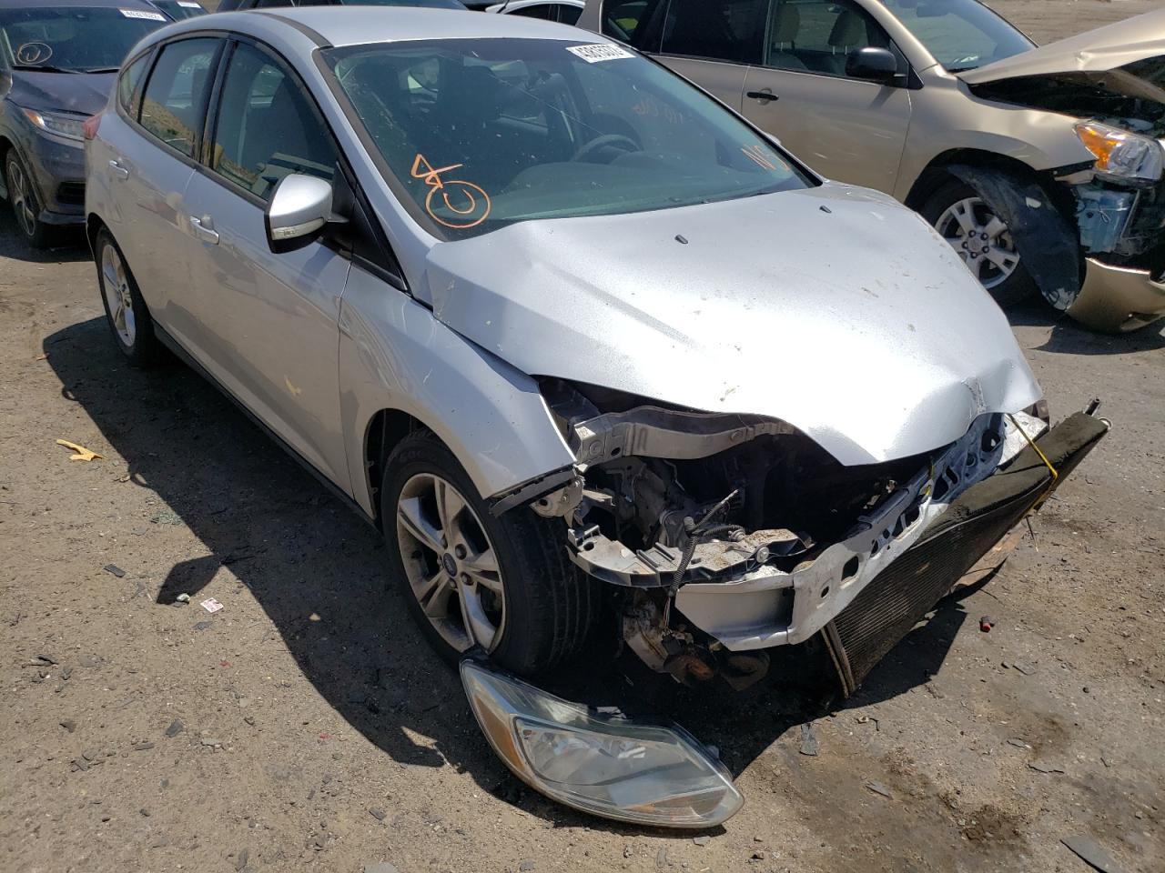 FORD FOCUS SE 2014 with VIN 1FADP3K26EL113069 - Photo from auction