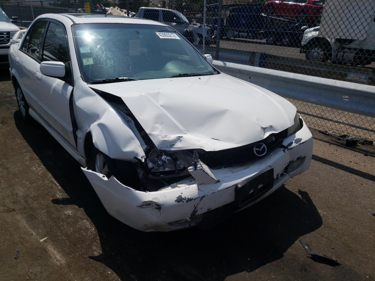 Photo 9 from auction – 2002 MAZDA PROTEGE DX with VIN JM1BJ225721586736