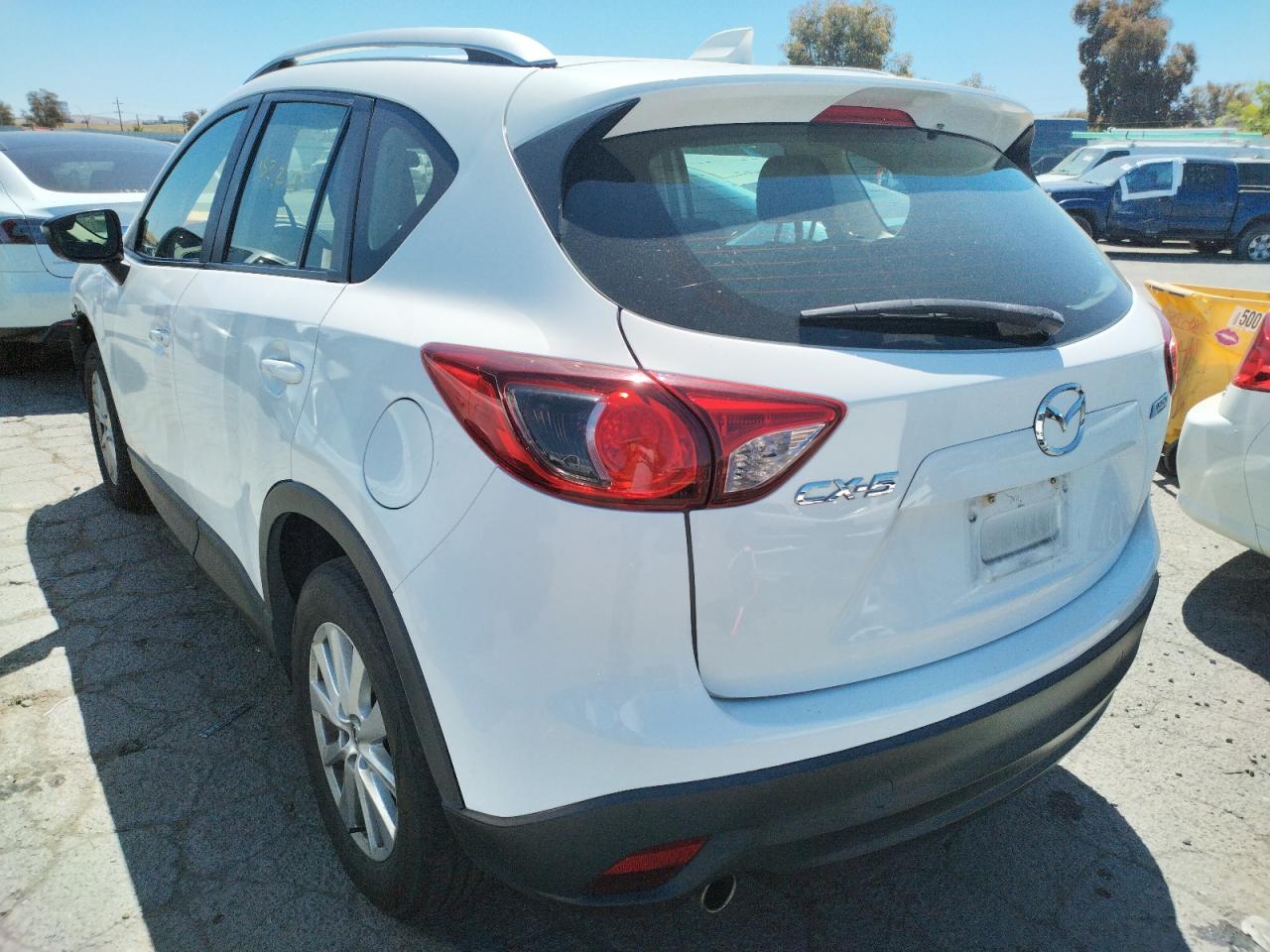 Photo 3 from auction – 2015 MAZDA CX-5 SPORT with VIN JM3KE2BE9F0480909