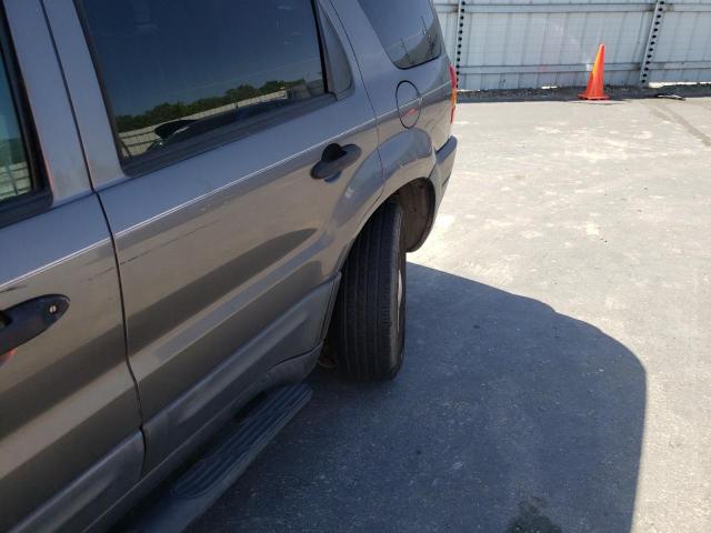 Photo 9 from auction – 2004 FORD ESCAPE XLS with VIN 1FMYU02134KA30189