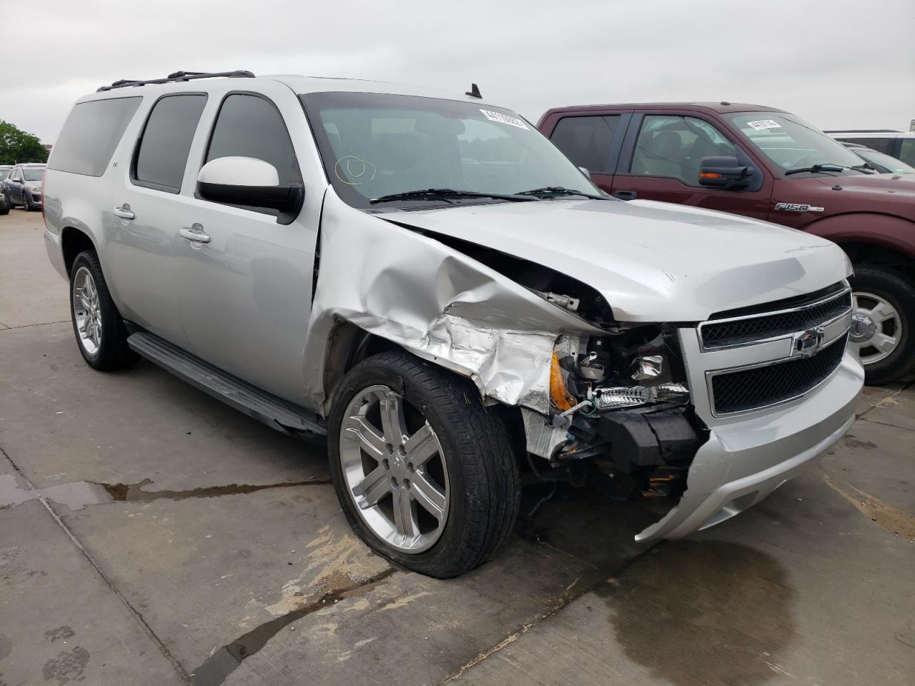 CHEVROLET SUBURBAN C 2011 with VIN 1GNSCJE03BR325438 - Photo from auction