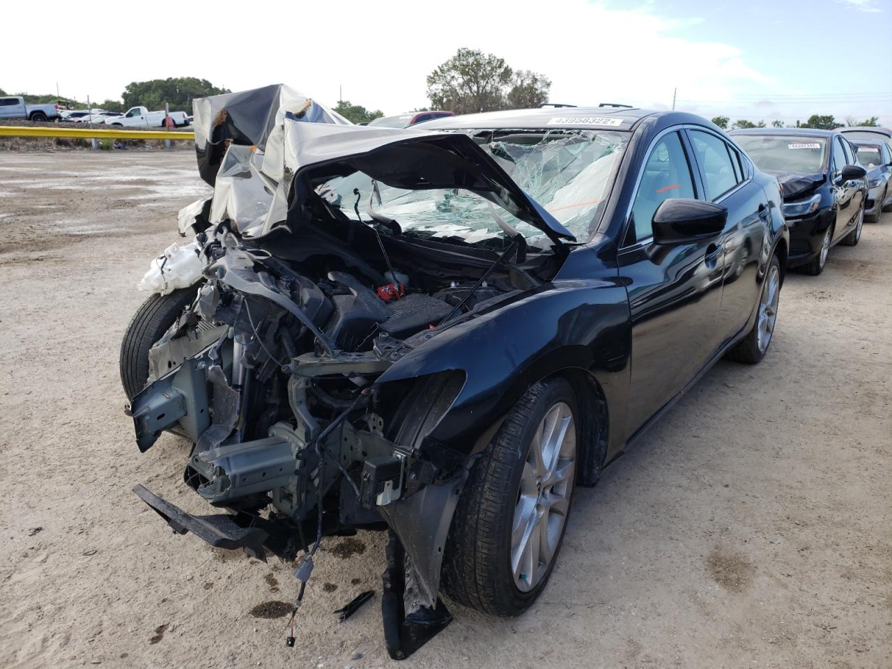 Photo 2 from auction – 2017 MAZDA 6 TOURING with VIN JM1GL1V51H1155520
