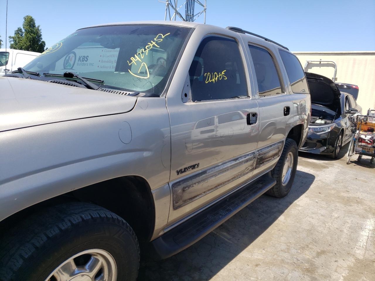 Photo 9 from auction – 2003 GMC YUKON with VIN 1GKEC13V63R263186