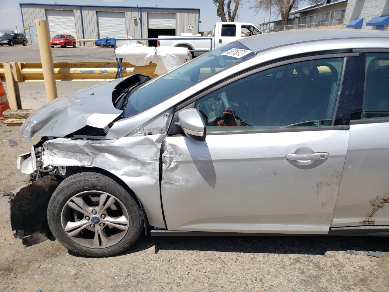 Photo 9 from auction – 2014 FORD FOCUS SE with VIN 1FADP3K26EL113069
