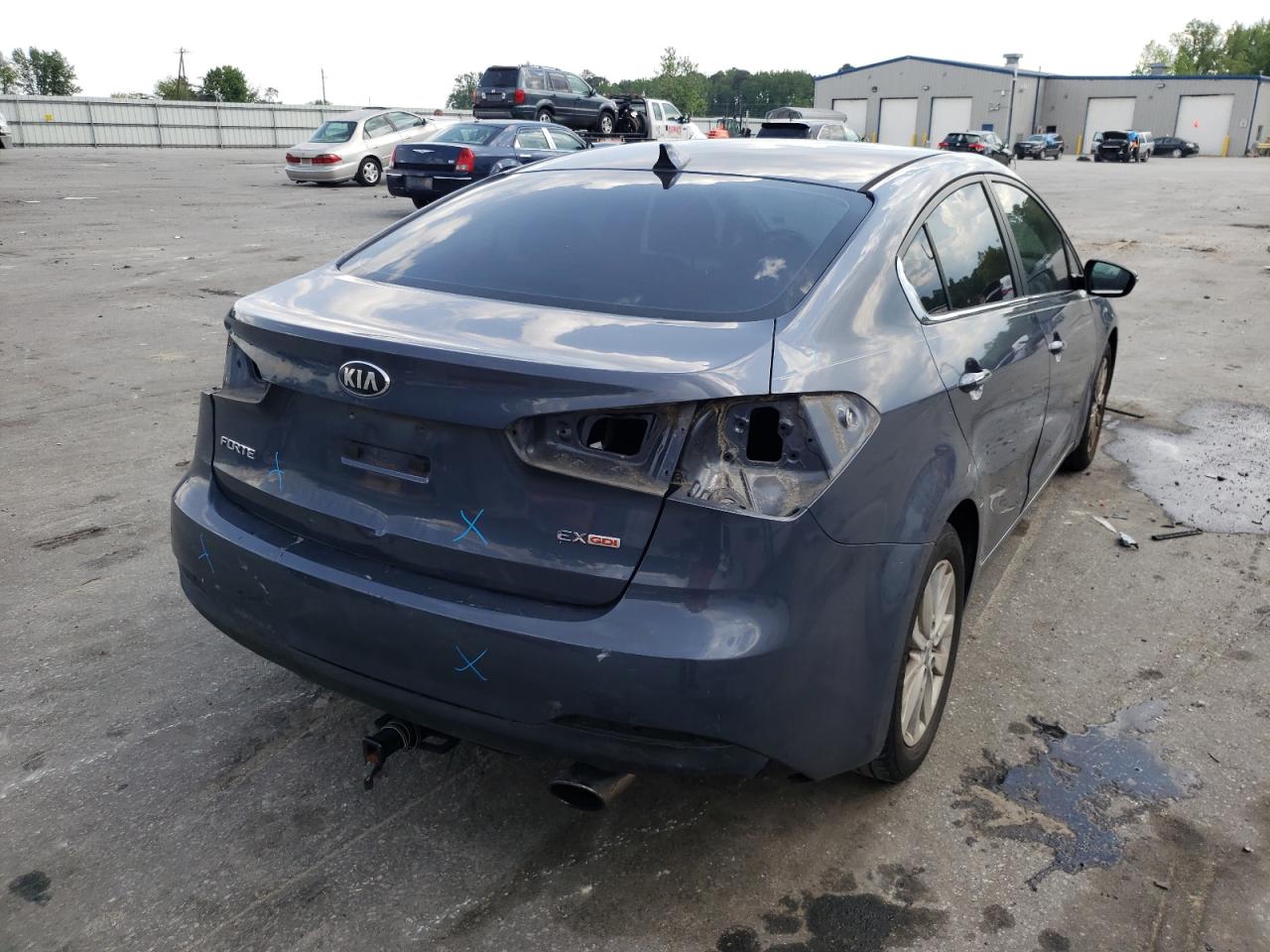 Foto 4 de la subasta – 2014 KIA FORTE EX con VIN KNAFX4A87E5047499