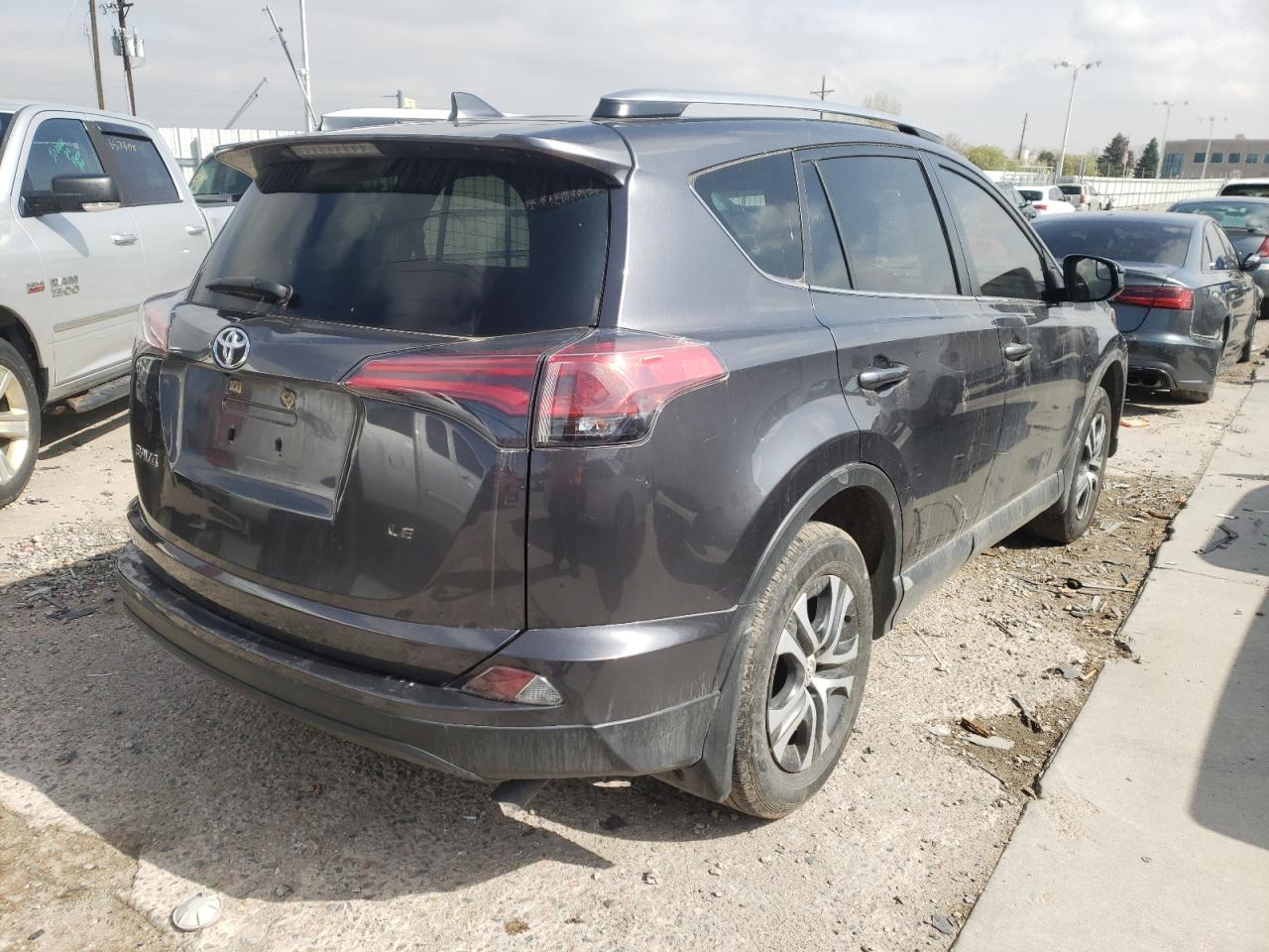 Photo 4 from auction – 2018 TOYOTA RAV4 LE with VIN JTMZFREV2JJ190040