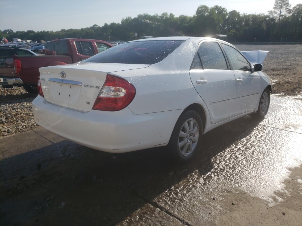 Photo 4 from auction – 2004 TOYOTA CAMRY LE with VIN 4T1BF30KX4U071016