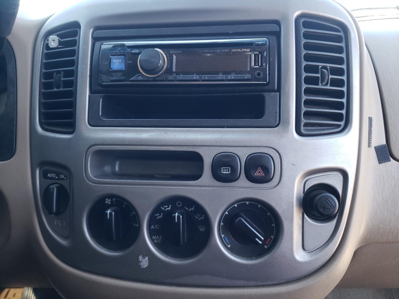 Photo 9 from auction – 2003 FORD ESCAPE XLT with VIN 1FMCU93123KA49831