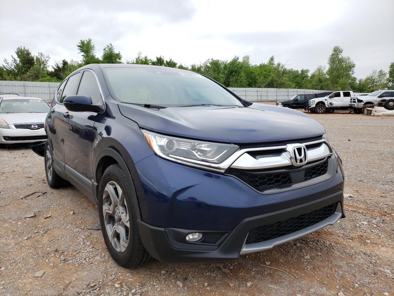 HONDA CR-V EXL 2017 with VIN 7FARW1H85HE001572 - Photo from auction