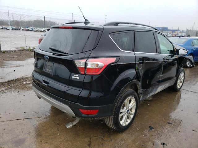Photo 4 from auction – 2018 FORD ESCAPE SE with VIN 1FMCU0GD4JUB41167