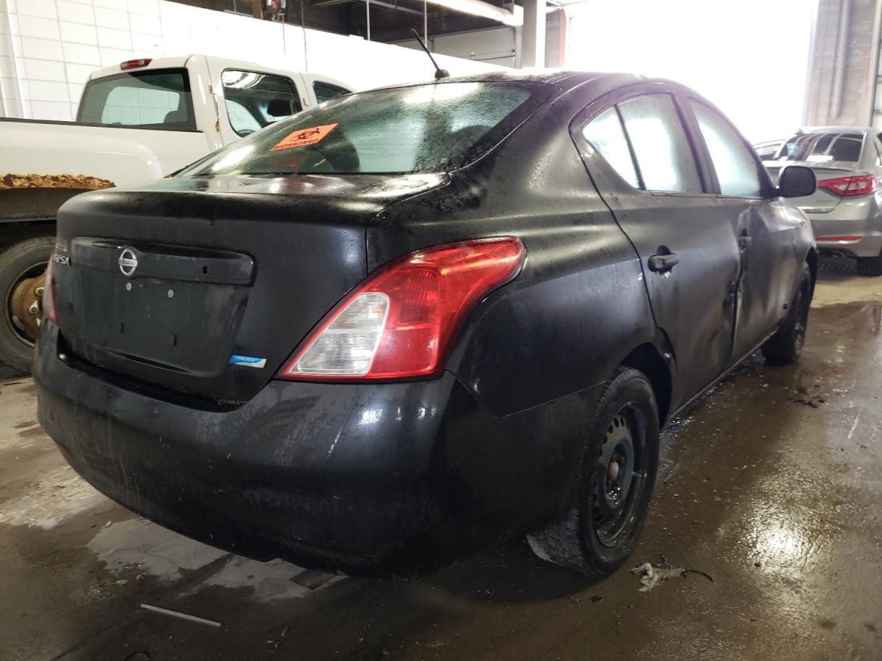 Photo 4 from auction – 2012 NISSAN VERSA S with VIN 3N1CN7AP5CL816490