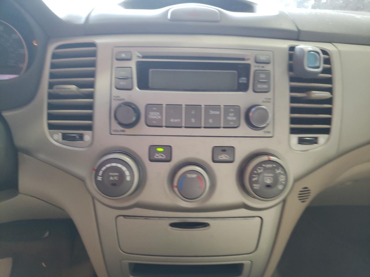 Photo 9 from auction – 2006 KIA OPTIMA LX with VIN KNAGE124165064868