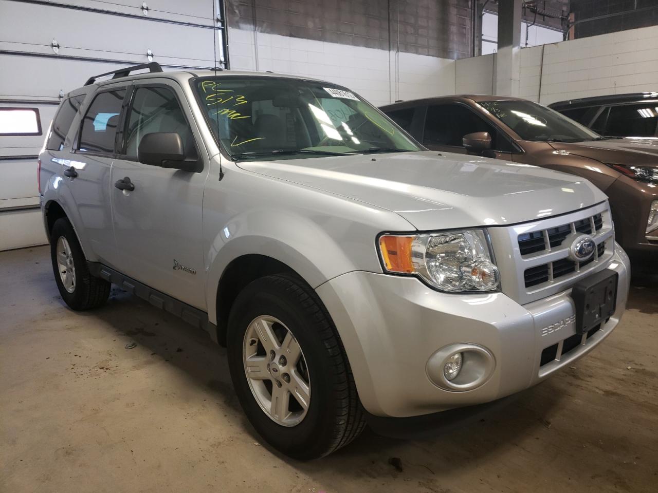 FORD ESCAPE HYB 2012 with VIN 1FMCU4K39CKA38637 - Photo from auction