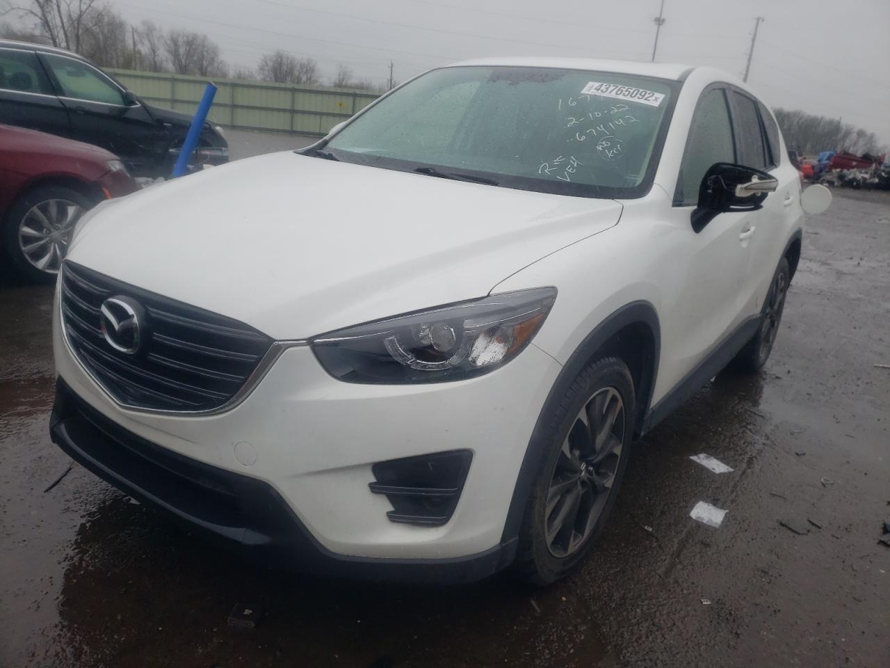Photo 2 from auction – 2016 MAZDA CX-5 GT with VIN JM3KE4DY8G0674142